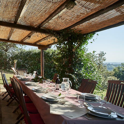 Dine alfresco with loved ones under the shade of the pergola
