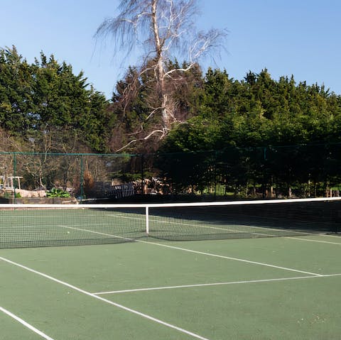 Head to the private tennis court for some friendly-competition 
