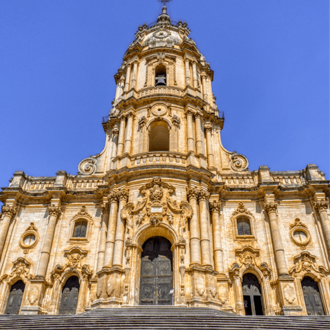 Disccover Modica's stunning Cathedral of St Giorgio, a twenty-eight-minute drive away