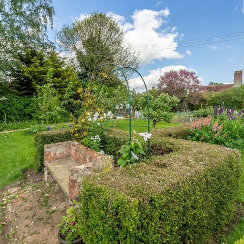 Start your day with a cup of tea in the pretty shared garden