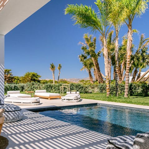 Relax in the shade or out in the sun in the gorgeous garden and pool area