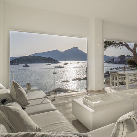 Relax on the couch as natural light pours in and the sun rises over the islands