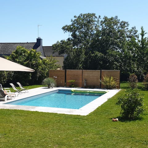 Hang out in the garden by the private swimming pool