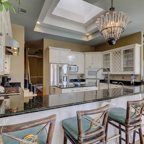 Cook while enjoying lively conversation in the exquisite kitchen