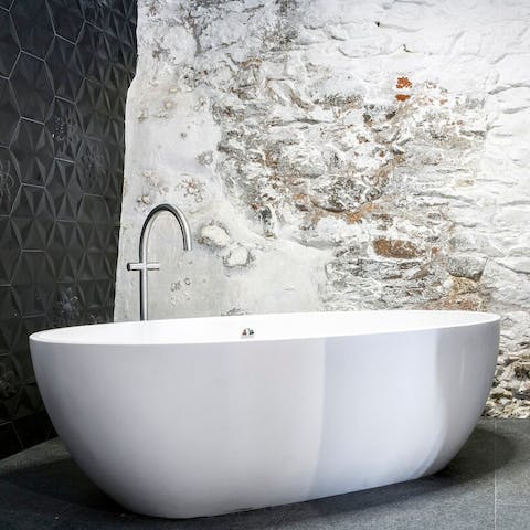 Go for a relaxing soak in the luxury bath
