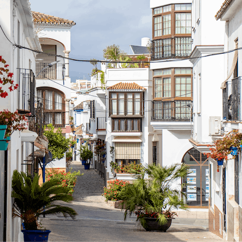 Explore the traditional resort town of Estepona, a short drive away