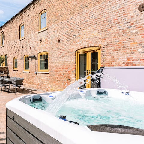 Relax after a day of fun in the 8 person hot tub