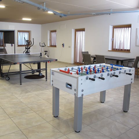 Challenge your friends to a game of table football or ping pong from the games room
