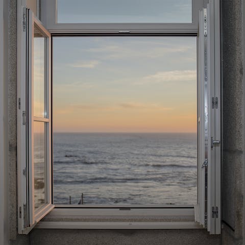 Watch the sunsetting into the ocean from your window