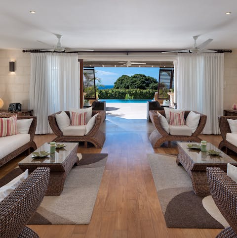 Entertain in the living space with its pool and ocean vistas