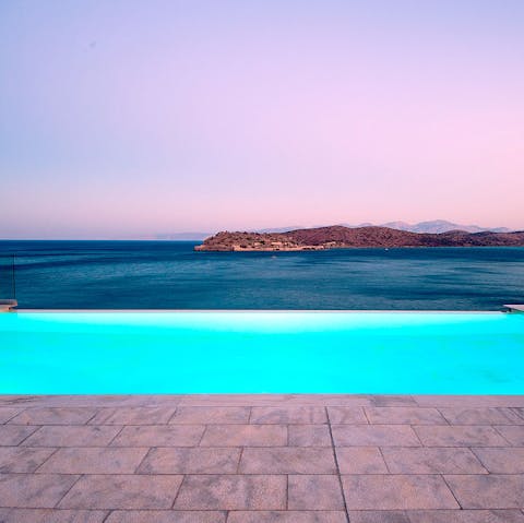 Enjoy views of the Sea of Crete as you float about in the swimming pool