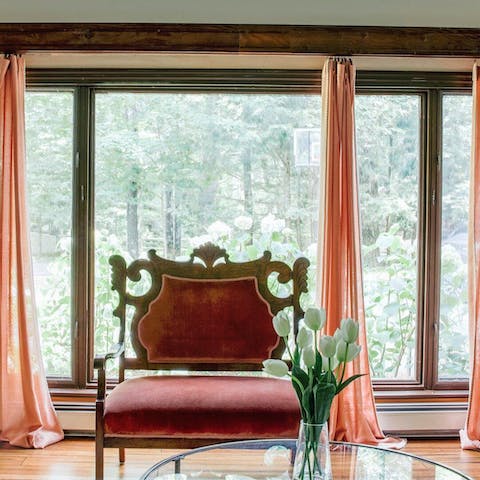 Choose the lounge with its view of the forest from floor-to-ceiling windows
