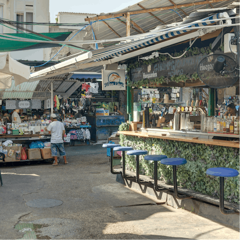 Take a twenty-minute walk to Carmel Market – the largest one around