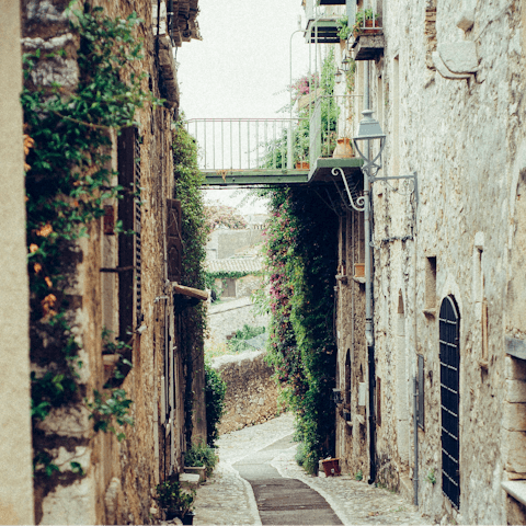 Explore the charming narrow streets of the historic Cortona