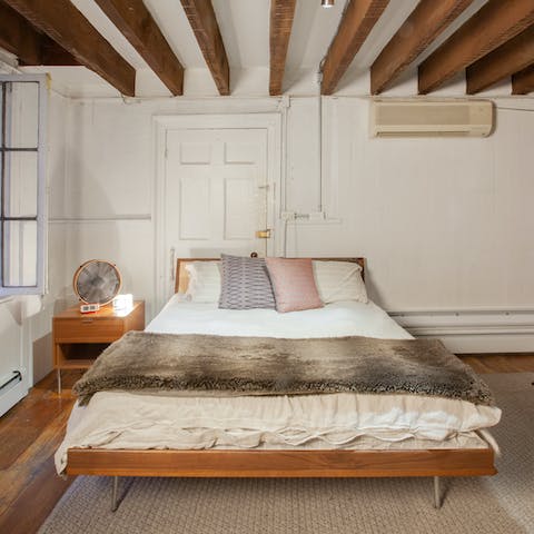 Get cosy in the comfortable bedroom