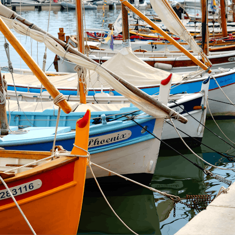 Stroll around the nearby port and stop off at one of the harbourfront restaurants