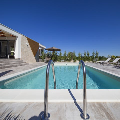 Plunge into your pristine private pool on the sun terrace