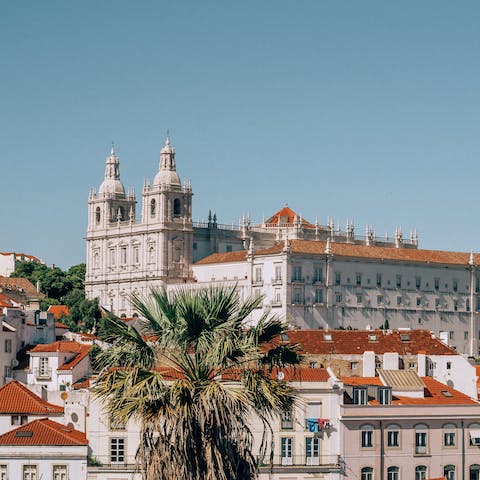 Explore Lisbon's traditional Alfama neighbourhood