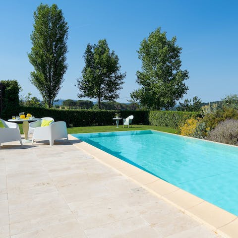 Spend lazy afternoons lounging by the outdoor pool