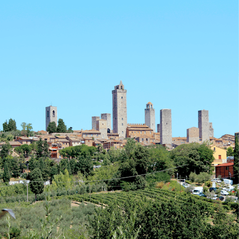 Discover the medieval town of San Gimignano, 23 kilometres away