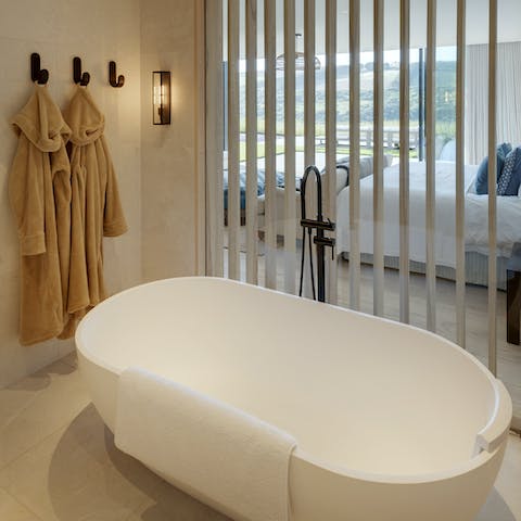 Treat yourself to an indulgent soak in the freestanding tub before wrapping yourself up in a dressing gown