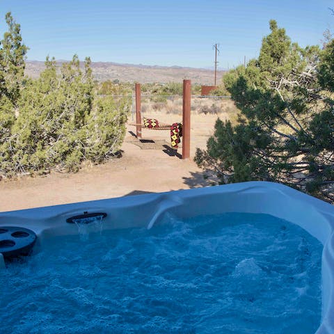 Relax in the hot tub or hammock