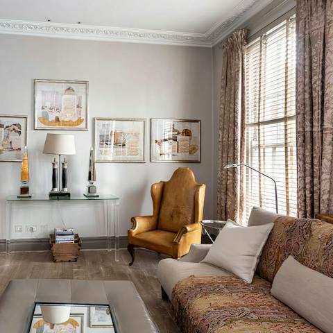Relax in the elegant living space with your morning coffee