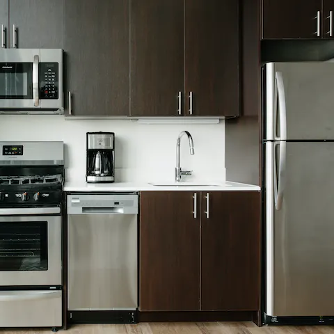 Fire up the coffee machine in the sleek kitchen area