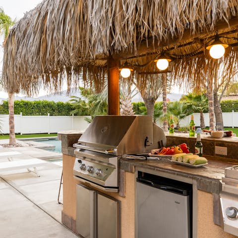 Light up the barbecue and get cooking in the poolside kitchen