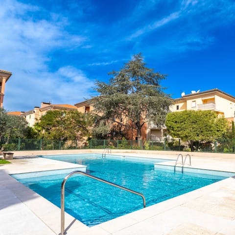 Swim in the communal pool to cool off in the Saint Tropez heat