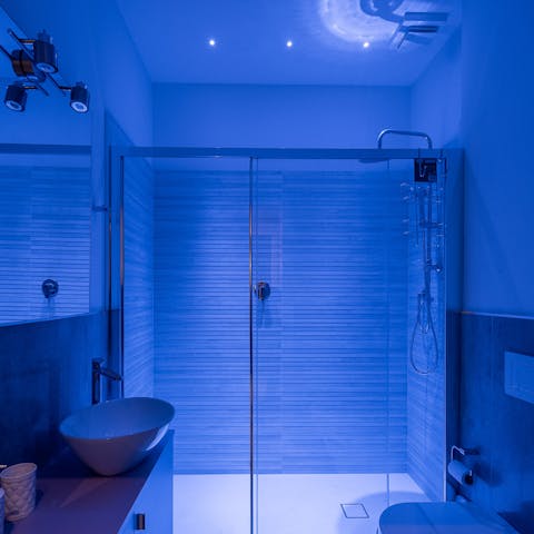 Enjoy a relaxing shower under the mood lighting to unwind at the end of the day