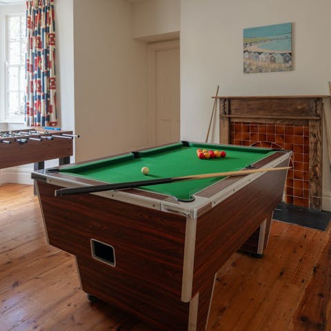 Unleash your competitive side at the pool table