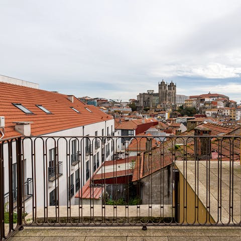 Take in the vistas of the city's cathedral from the private balcony