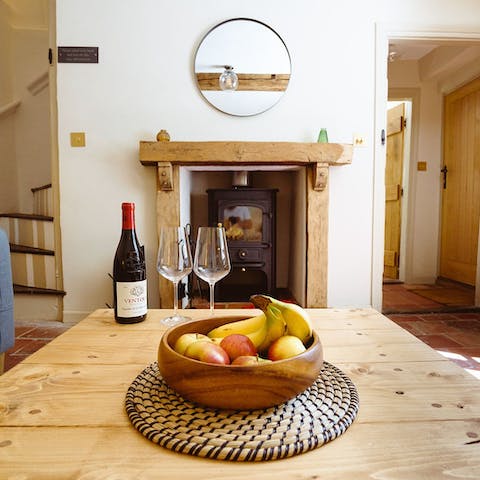 Put some kindling into the wood burner and get toasty besides the warmth