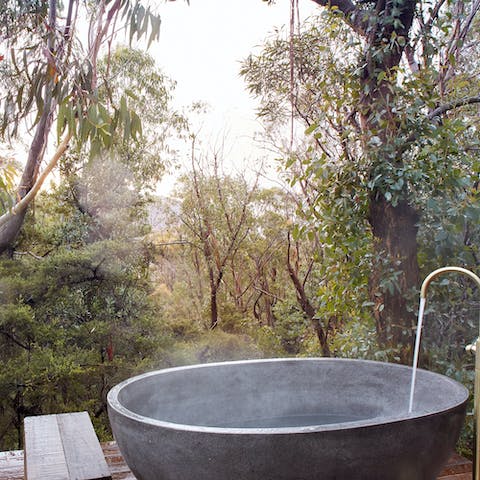 Indulge in an outdoor bathing ritual amid the trees