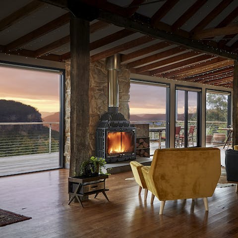 Get a fire crackling in the huge stove and watch the sun set