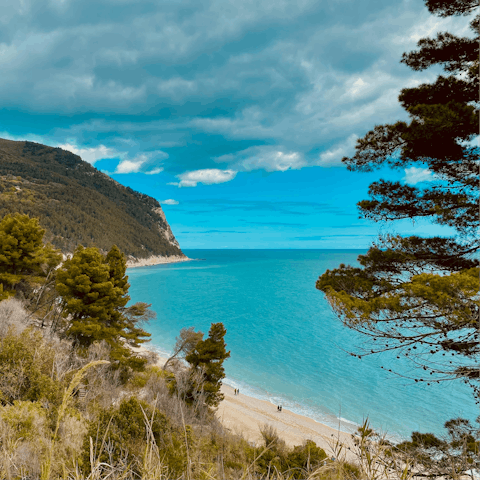 Head north towards Ancona, discovering stunning beaches like Sirolo (48km away) along the route
