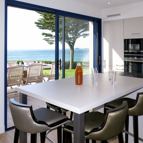 Push open the sliding doors and breathe in the fresh sea air every morning