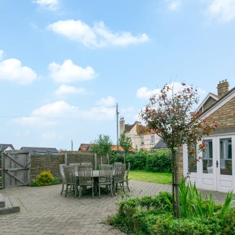 Gather the group for lunch in the sun on the private patio