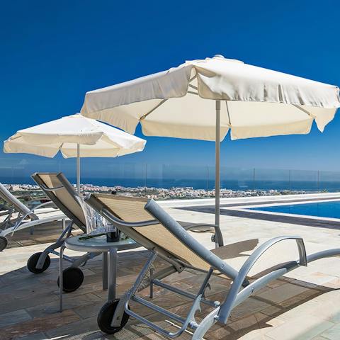 Relax on a sun lounger and admire the view out to sea