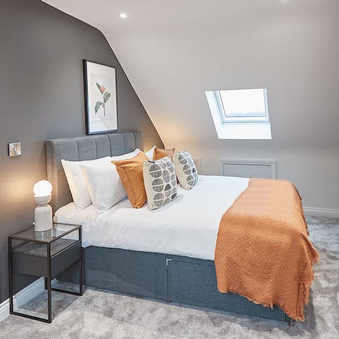 Snuggle up after a long day in the sumptuous beds – the loft bedroom has beautiful views 