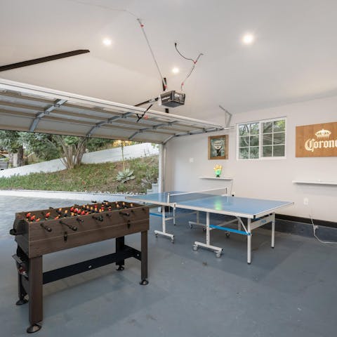 Get competitive in the garage converted into a games room