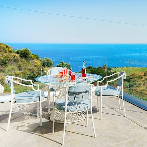 Savour sunset views and aperitivos on the balcony 