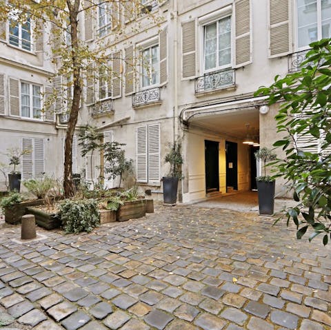 Stroll through the idyllic courtyard each day as you leave and arrive at the apartment