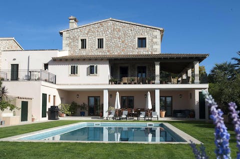 Descend into the sapphire blue swimming pool and feel a sense of calm wash over you