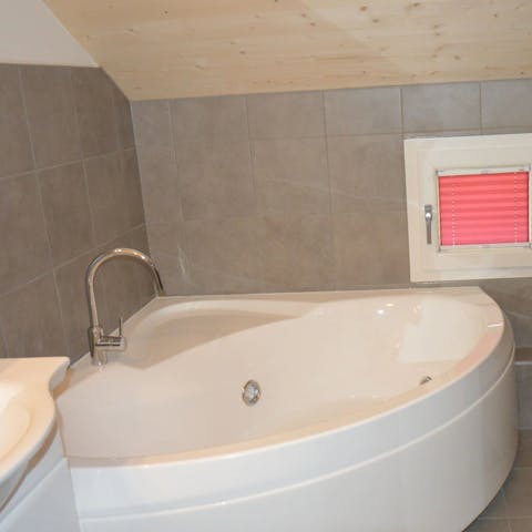Treat yourself to a long soak in one of the large bathtubs