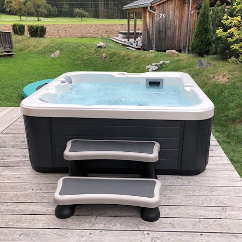 Breathe in fresh mountain air while you relax in the hot tub