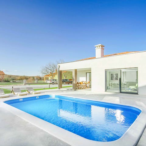 Cool off in the private pool after a long sunbathing session