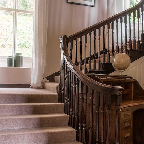 Make an entrance down the sweeping staircase – it would be rude not to