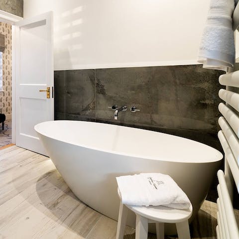Treat yourself to a bath in any one of the tubs across the two homes